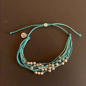 teal puravida bracelet with silver beads
